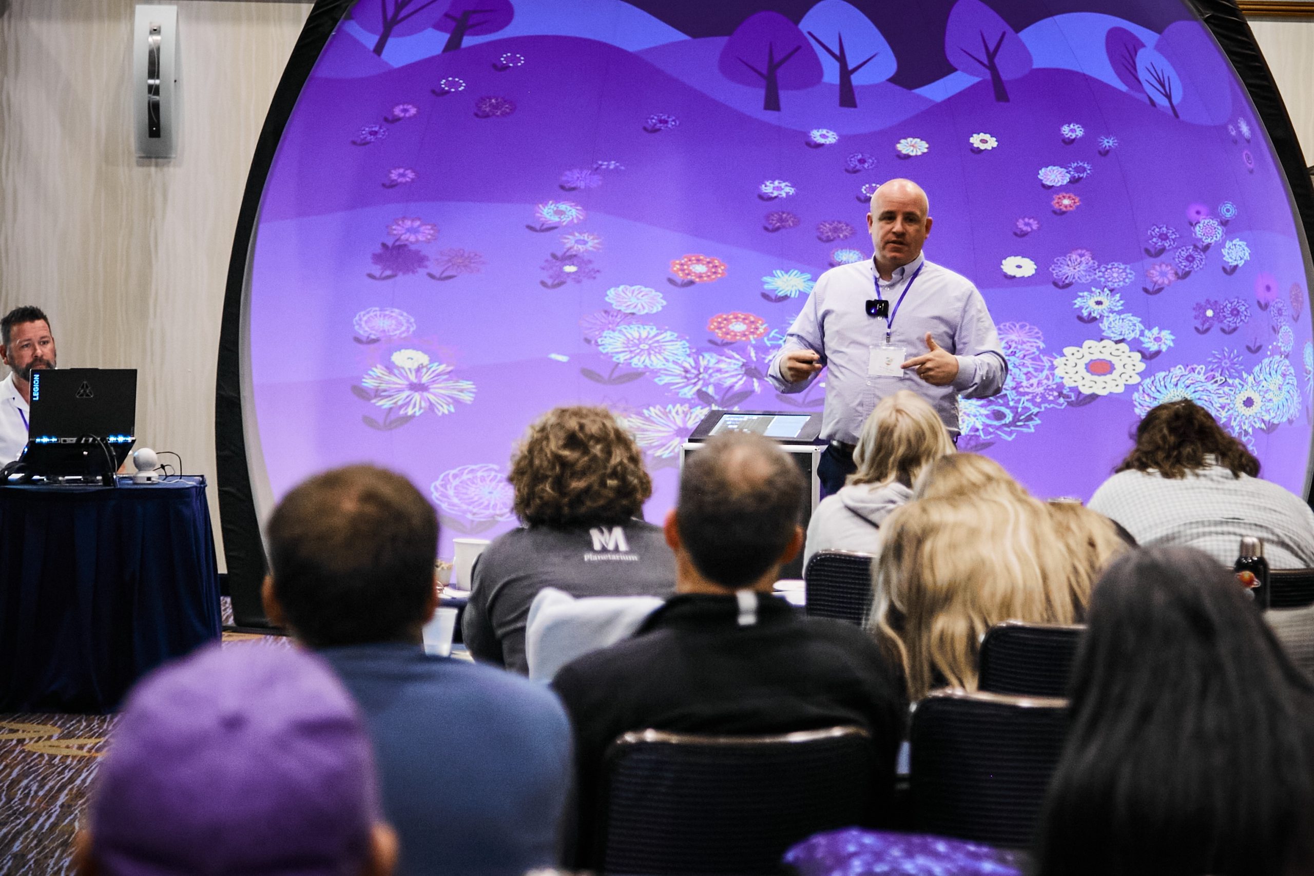 Daniel Forrester gives a presentation at the Elumenati GeoDome Network Conference